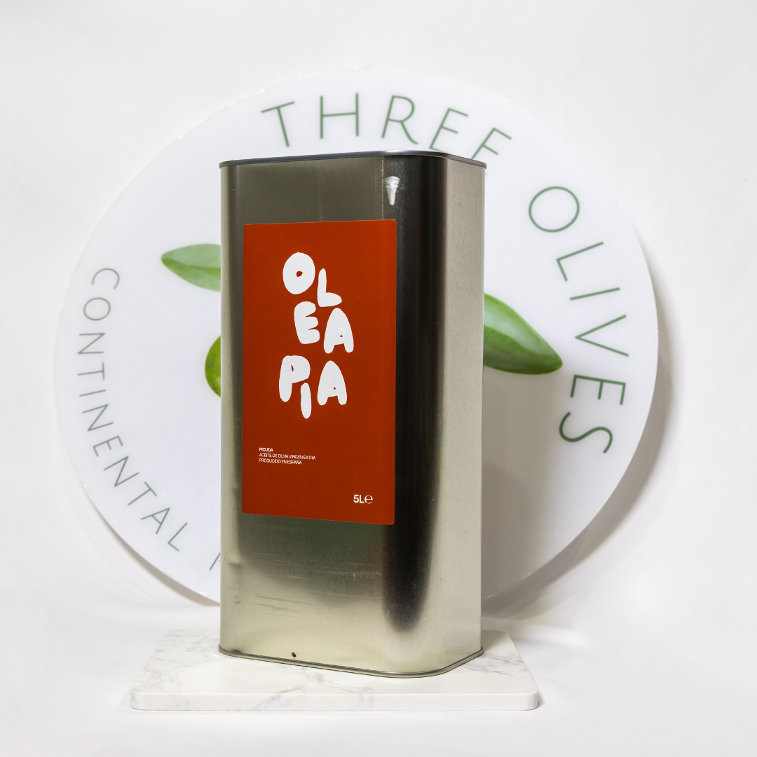 Metallic canister with red label featuring 'Olea' branding on a white background with 'Three Olives' logo.