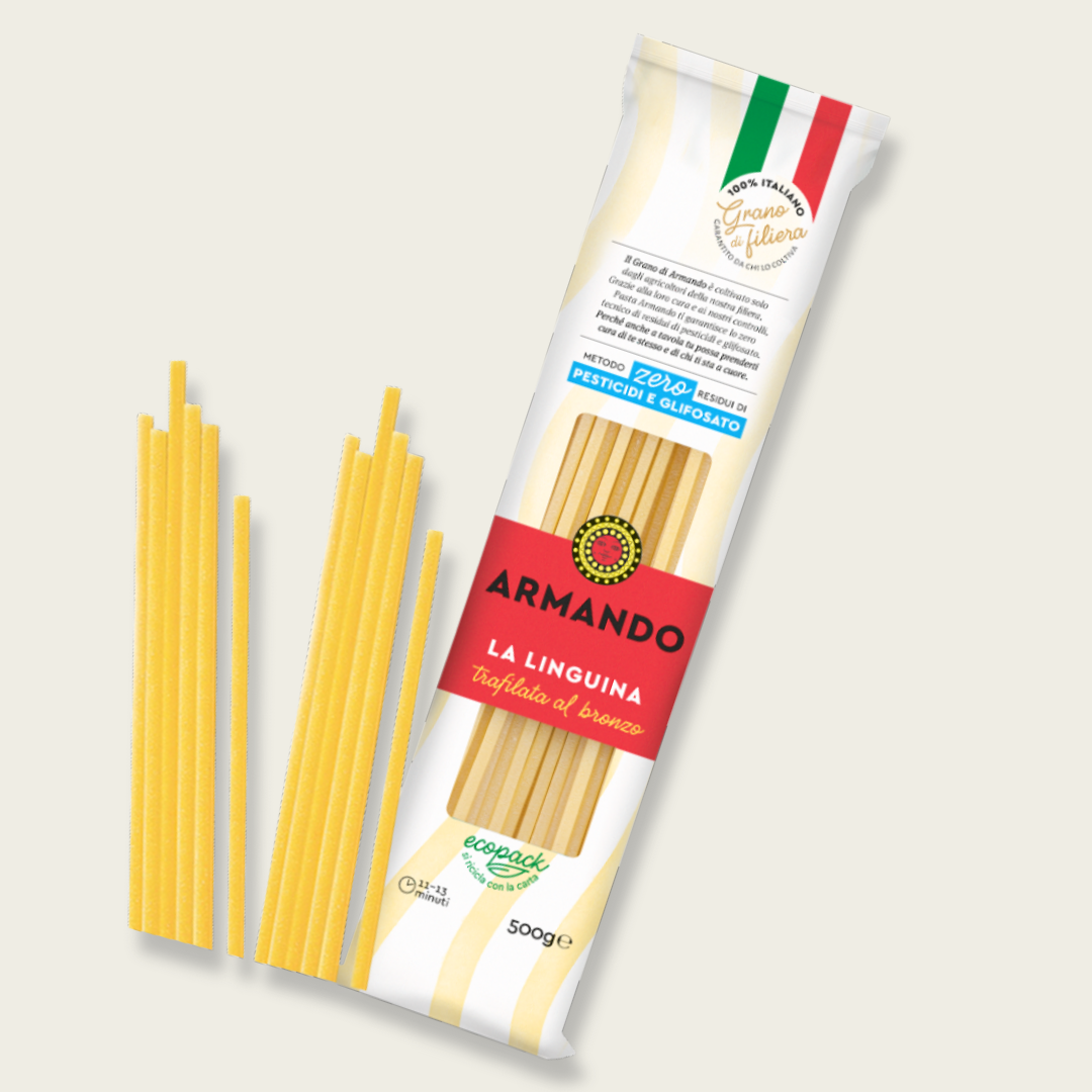 Packaged spaghetti with a visible brand label on a light background