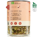 Tea packaging with glass jar of tea leaves andBio Hellas logo