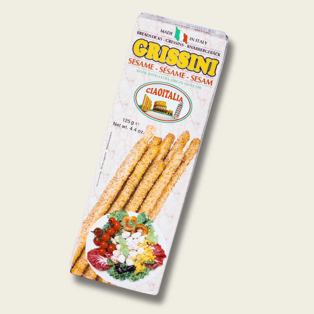 Box of Crissini sesame sticks with a salad image on a light background