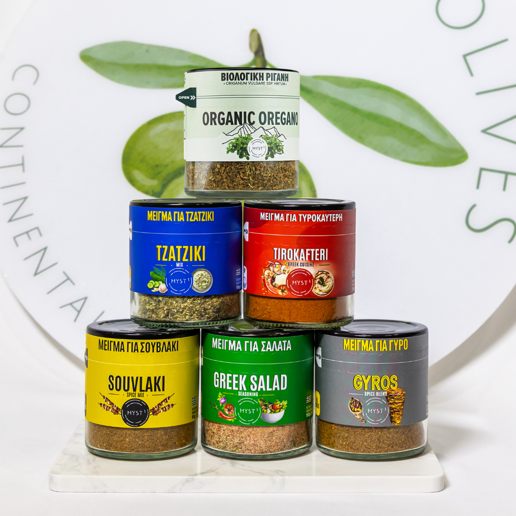 Stack of spice containers with labels on a white background