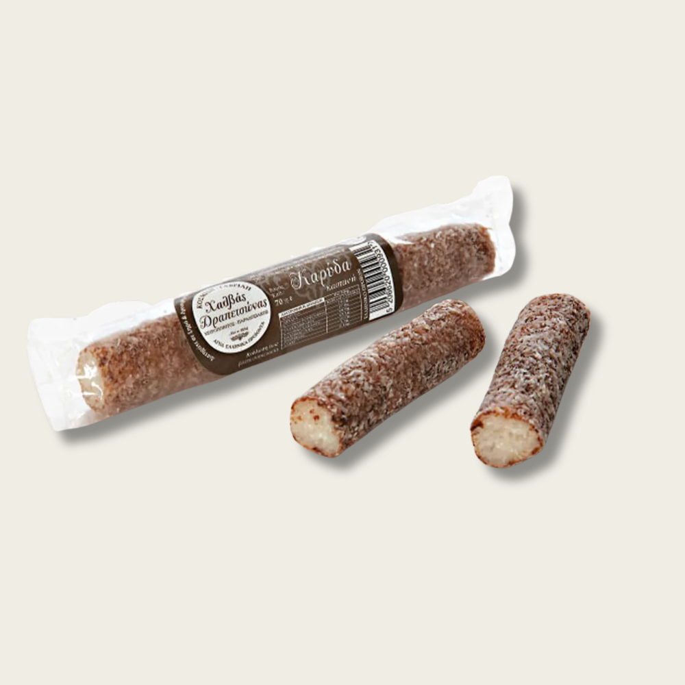 Two wrapped and two unwrapped cookies on a light beige background