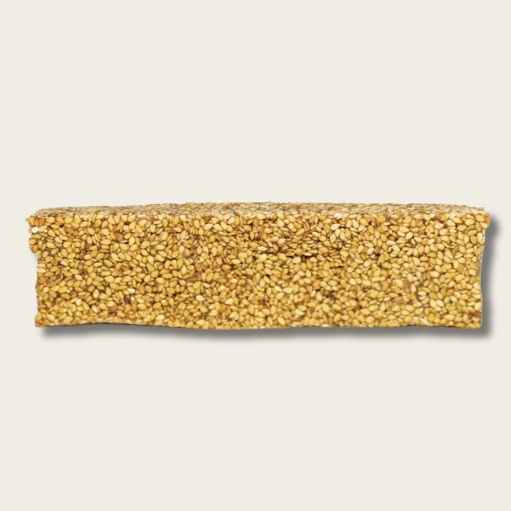 Rectangular bar of quinoa on a beige background