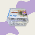 Container of flowers with Greek branding on a light purple background