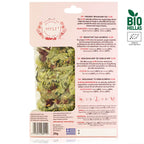 Tea package with green tea leaves and text on a white background