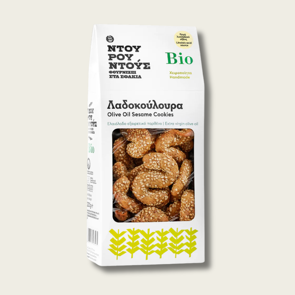 Packaging of olive oil sesame cookies with visible branding on a light gray background