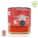 Jar of sweet paprika with a red label on a white background