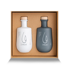 Two Stalia bottles, one white and one gray, in a cardboard box on a white background.