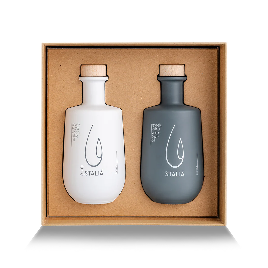 Two Stalia bottles, one white and one gray, in a cardboard box on a white background.