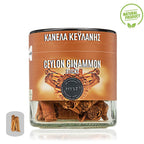 Jar of Ceylon cinnamon sticks with a brown label on a white background