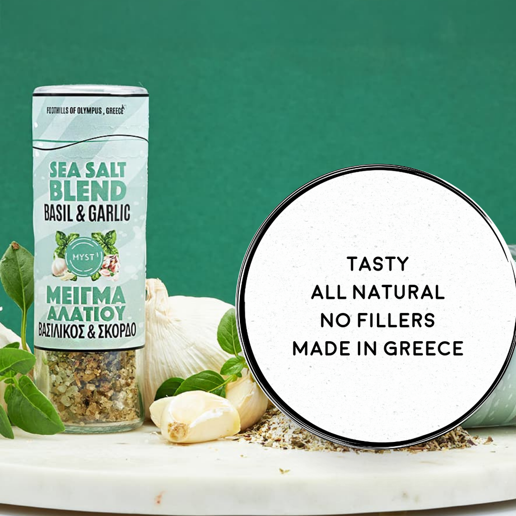 Sea salt blend container with basil and garlic on a green background
