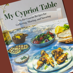Cookbook titled 'My Cypriot Table' on a brown background