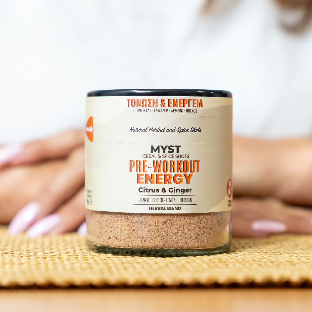 Pre-workout energy supplement jar with visible branding on a blurred background