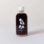 Bottle of Oleapia on a light background