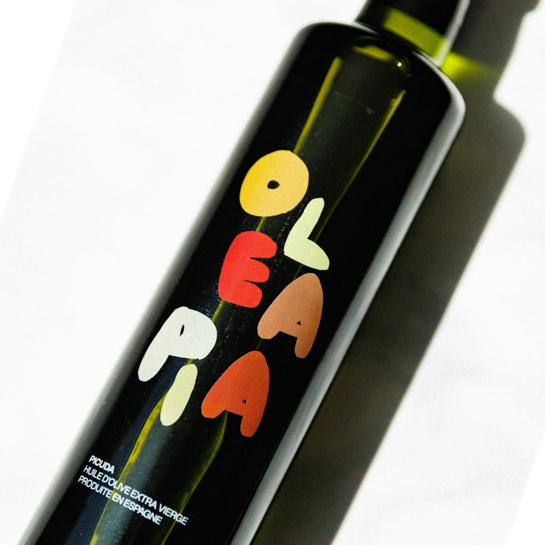 Bottle of olive oil with colorful label on a white background