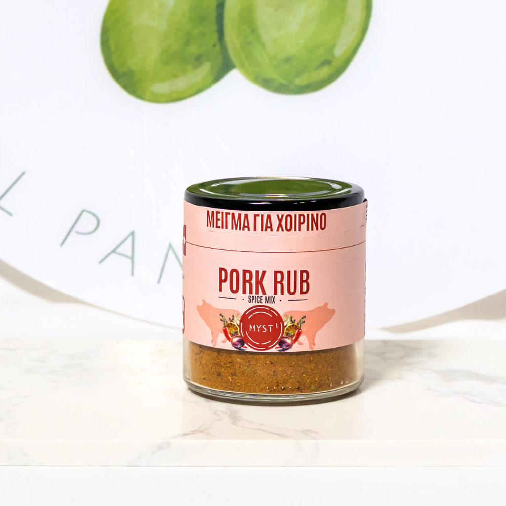 Pork rub spice mix container with green leaves on a white background