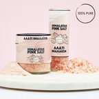 Two containers of Himalayan pink salt with visible salt crystals on a light pink background.