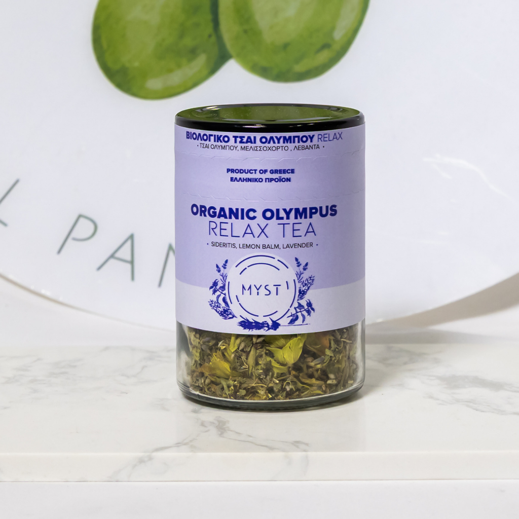 Jar of Organic Olympus Relax Tea with a purple label on a white surface.