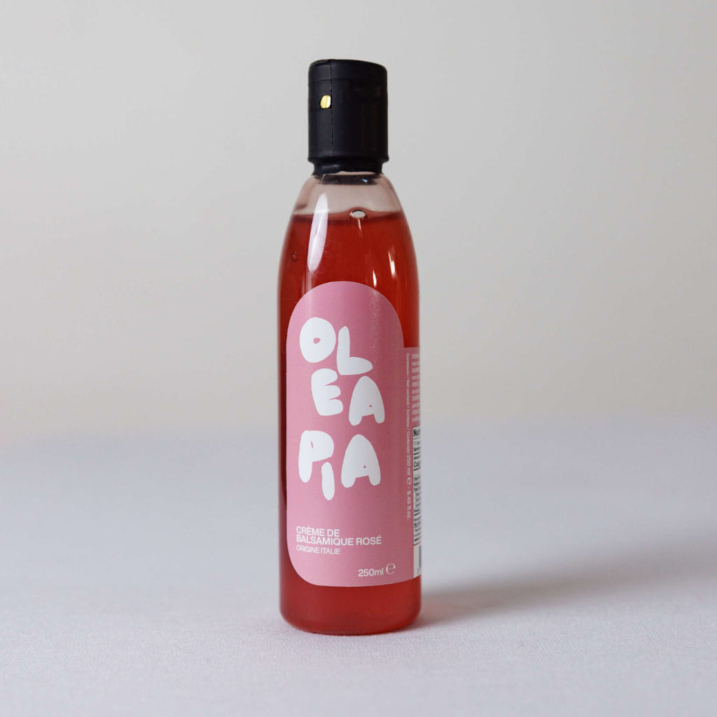 Bottle of Olea Rosa on a light gray background