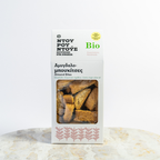 Packaged almond bites with branding on a marble surface