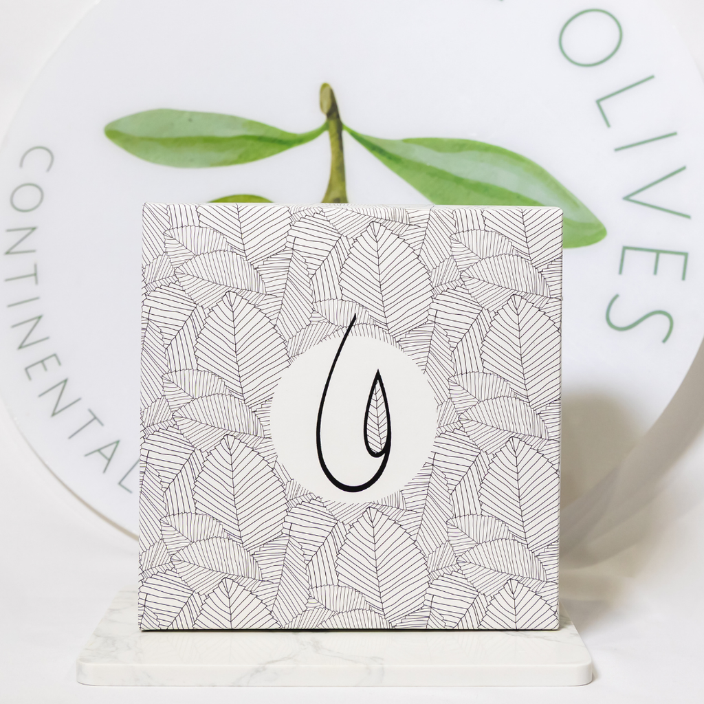 Card with leaf pattern and olive branch on a white background