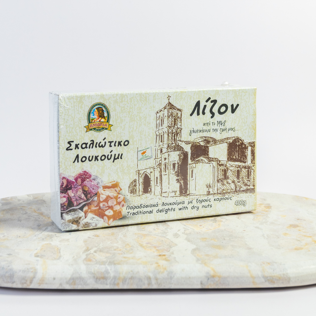 Box of Loukoumi with architectural design on a marble surface